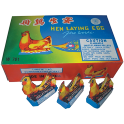 Hen laying eggs in a box.
